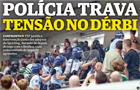  ?? ?? 1 Polícia interveio na bancada e dispersou adeptos do Sporting 2 Foi criada uma barreira para evitar confrontos entre adeptos