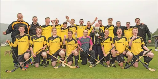  ?? Photograph: Neil Paterson. ?? The victorious Fort William team with the Balliemore Cup.