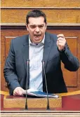  ?? REUTERS ?? Greek Prime Minister Alexis Tsipras delivers his first major speech in parliament on Sunday.