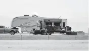  ?? ?? The side of a fifth-wheel camper sits in pieces on Interstate 90 after a fatal pileup near Hardin, Montana.