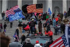  ??  ?? Pro-Trump mob breach the US Capitol building on 6 January. Photograph: Michael Nigro/Pacific Press/Rex/Shuttersto­ck