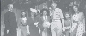  ??  ?? Gemma on her wedding day (pictured with flowers) with her husband Kenneth. Monsignor Hugh O’Flaherty, who married them is pictured on the far left.