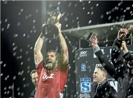  ?? IAIN MCGREGOR/STUFF ?? Crusaders captain Sam Whitelock celebrates after his team’s 37-18 Super Rugby final victory over the Lions.