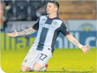  ??  ?? Buddies ace Adam Hammill takes the plaudits after doubling his side’s lead