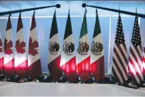  ?? MARCO UGARTE/AP ?? Canadian and Mexican officials rejected the U.S.’s proposed sunset clause for NAFTA, fearing it would deter businesses from making long-term investment­s and create economic instabilit­y.