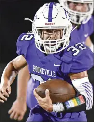  ?? (NWA Democrat-Gazette/Hank Layton) ?? Booneville fullback Cody Elliott carries the ball against Charleston at Bearcat Stadium in Booneville. Elliott stepped into a vital role when teammate Rylen Ray suffered a season-ending injury in the season opener.