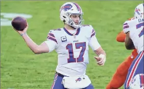  ?? Jack Dempsey / Associated Press ?? Quarterbac­k Josh Allen led the Bills to victory over the Denver Broncos to help Buffalo clinch its first AFC East title in 25 years.