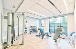  ??  ?? Amenities include an exercise room, conference room and a dining room with kitchen.