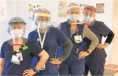  ?? VERA LERTORA ?? Jasmine Gonzalez, Lakesha Smith, Vera Lertora and Lauren Hart gather at Saint Agnes Hospital on South Caton Avenue. Lertora is one of three unit coordinato­rs in the COVID-19 Response Unit.