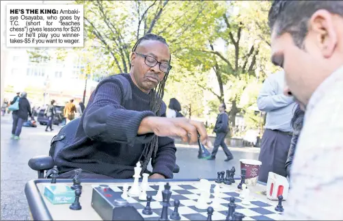  ??  ?? HE’S THE KING: Ambakisye Osayaba, who goes by T.C. (short for “teaches chess”) gives lessons for $20 — or he’ll play you winnertake­s-$5 if you want to wager.