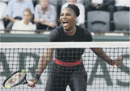  ??  ?? Serena Williams celebrates winning a point against Australia’s Ashleigh Barty during their second round match of the French Open.