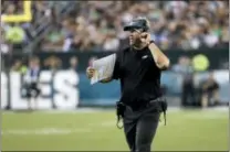  ?? MICHAEL PEREZ — THE ASSOCIATED PRESS ?? Eagles’ head coach Doug Pederson paces the sideline during last Thursday’s game against the Falcons. Pederson named Super Bowl LII MVP Nick Foles his starting QB for Sunday’s game against Tampa Bay.