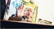  ?? AP ?? President Donald Trump talks with reporters during a signing ceremony for the Save Our Seas Act of 2018 in the Oval Office of the White House yesterday in Washington.