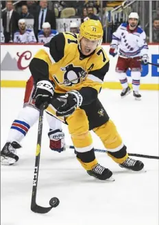  ??  ?? Penguins center Evgeni Malkin scored twice Sunday against the Rangers, signaling he is breaking out of a slump.