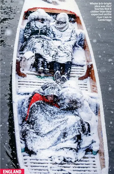  ??  ?? Whose b-b-bright idea was this? Tourists find it chillier than they expected on the river Cam in Cambridge ENGLAND