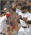  ?? STAFF PHOTO BY MATT WEST ?? POWERFUL STATEMENT: Jackie Bradley Jr. (right) celebrates his two-run home run with Christian Vazquez last night.