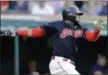  ?? TONY DEJAK — THE ASSOCIATED PRESS ?? The Indians’ Carlos Santana watches his double off Tigers starting pitcher Justin Verlander during the second inning.