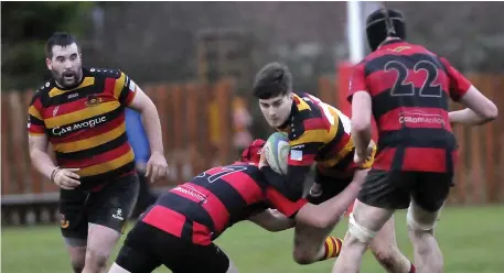  ??  ?? Sligo RFC’s Niall Gray carries with Shane McGuinness in support during their Division 2C game with Tullamore. Pics: Carl Brennan.