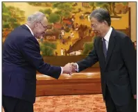  ?? (AP/Andy Wong) ?? Visiting U.S. Senate Majority Leader Chuck Schumer (left), D-N.Y., is greeted by Zhao Leji, chairman of China’s National People’s Congress, before their bilateral meeting Monday at the Great Hall of the People in Beijing.