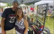  ?? PHOTOS BY MARAH MORRISON — THE NEWS-HERALD ?? John and Carol Richards, who were in attendance at the 40th Annual Chardon Square Arts Festival, started North Coast Bottle Openers out of their garage.