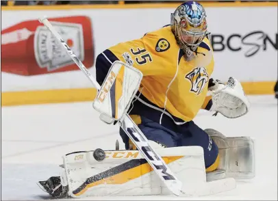  ?? The Associated Press ?? STOPPER: Nashville goalie Pekka Rinne makes one of his 38 saves in the Predators’ 6-3 victory over the Anaheim Ducks in the series-clinching sixth game of the NHL Western Conference finals. The Stanley Cup Final begins Monday night with Nashville...