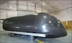  ?? Jessie Wardarski/Post-Gazette ?? A Virgin Hyperloop One cargo pod is stored at the Hyperloop testing facility in Apex, Nev.
