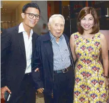  ??  ?? Rustan Commercial Corp. president Donnie Tantoco, Ambassador Bienvenido Tantoco Sr. and PeopleAsia editor-in-chief Joanne Rae Ramirez.