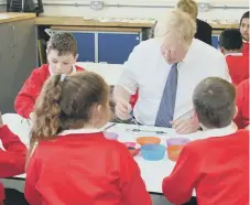  ??  ?? The Prime Minister with Richard Avenue Primary School pupils.