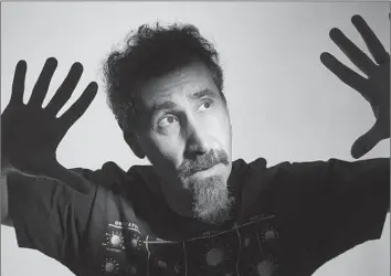  ?? Travis Shinn Photograph­y ?? “WE’RE a family. We’ve been together for 30 years,” Serj Tankian says of his band, System of a Down, which has an upcoming show scheduled in San Francisco. Any new music in the offing? “Time will tell,” he says.