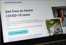  ?? STEVEN SENNE — THE ASSOCIATED PRESS ?? A U.S. government website features a page where people can order free, at-home COVID-19tests. The website, COVIDTests.gov, allows people to order four at-home tests per residence and have them delivered by mail.