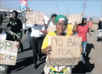 ??  ?? ENRAGED: Tsakane residents protest outside court, where a 61-year-old man appeared on a charge of rape.