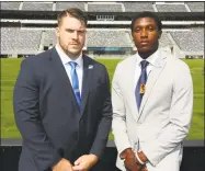  ?? Larry Levanti / NEC / Contribute­d photo ?? Central Connecticu­t defensive lineman Chris Tinkham and wide receiver Courtney Rush pose for a photo during NEC media day at MetLife Stadium in East Rutherford, N.J. on Tuesday.