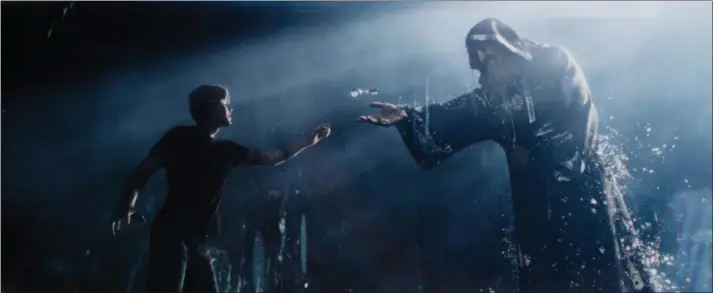  ?? WARNER BROS. PICTURES ?? Tye Sheridan’s Parzival, left, meets the avatar of Mark Rylance’s James Halliday in a scene from “Ready Player One.”