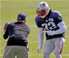  ?? MATT STONE / HERALD STAFF ?? FAMILIAR WITH THE ENEMY: Devin McCourty goes through drills during practice Wednesday ahead of Sunday night’s game against Tom Brady and the Bucs.