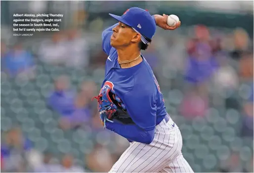  ?? ASHLEY LANDIS/AP ?? Adbert Alzolay, pitching Thursday against the Dodgers, might start the season in South Bend, Ind., but he’d surely rejoin the Cubs.