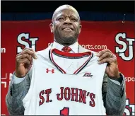  ?? AP/Newsday/CRAIG RUTTLE ?? Mike Anderson was introduced as the new coach at St. John’s on Friday at Madison Square Garden in New York. Anderson was fired March 26 after eight seasons at Arkansas.