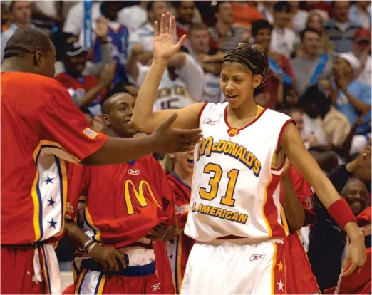  ?? AP ?? Parker has had star power in the Chicago area going all the way back to her high school days with Naperville Central. She was a McDonald’s All-American (above) in 2004.