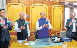  ?? HT PHOTO ?? HP chief minister Jai Ram Thakur launching the theme song of ‘Har Ghar Tiranga’ composed and sung by state police orchestra ‘Harmony of Pines’, at Vidhan Sabha in Shimla on Friday.