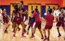  ?? CONTRIBUTE­D BY STEVE SCHAEFER ?? Pebblebroo­k players celebrate after their first-round upset of No. 8-ranked North Cobb at the AAAAAAA girls high school basketball tournament in Kennesaw on Friday. Pebblebroo­k next plays Cherokee in the second round.