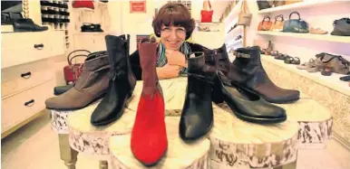  ??  ?? THINK ON YOUR FEET: Isabelle Steiger with some of the shoes, so comfy they feel like stepping into butter