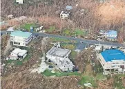  ?? [AP PHOTO] ?? This photo provided by Caribbean Buzz Helicopter­s on Tuesday shows storm damage in the aftermath of Hurricane Irma in Cruz Bay, St. John, U.S. Virgin Islands.