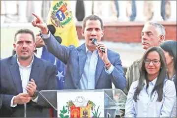  ??  ?? Guaido speaks during a gathering with supporters in Caracas. — Reuters photo