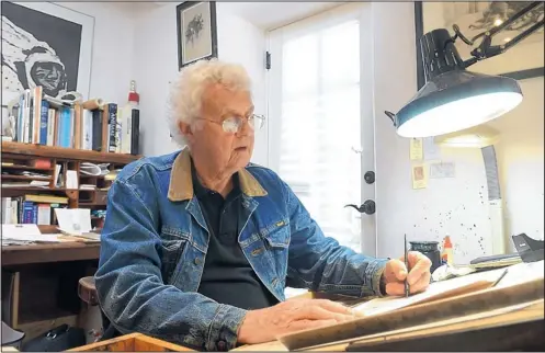  ?? DEAN HANSON/JOURNAL ?? Editorial cartoonist Patrick Oliphant at work in his Santa Fe studio.