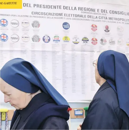  ?? TIZIANA FABI/AFP/GETTY IMAGES ?? Nuns line up to vote in Rome on Sunday in one of Italy’s most uncertain elections. Far-right and populist parties are expected to make major gains and Silvio Berlusconi is set to play a leading role. “You feel as if you have gone there prepared, but...