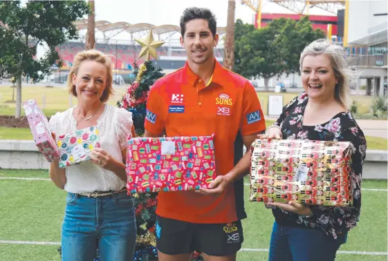  ?? Picture: SUPPLIED ?? Rizeup ambassador Shelley Craft with founder Nicolle Edwards and Gold Coast Suns veteran Michael Rischitell­i.