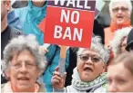  ?? TED S. WARREN, AP ?? Protesters gather outside a court hearing in Seattle over President Trump’s order to temporaril­y bar travel from six majorityMu­slim countries. Courts have blocked the order.