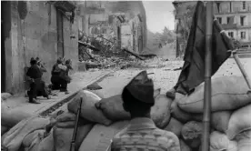  ?? Photograph: STF/AFP/Getty Images ?? Republican­s battle for the Alcazar in Toledo where rebels are sheltered in July 1936.