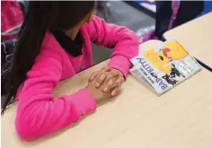  ??  ?? A third-grade student at El Camino Real Academy prepares for PARCC testing Wednesday. Students were allowed to read books between and after testing.