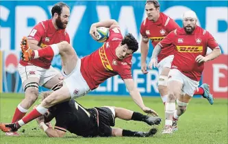  ?? GERARD JULIEN AFP/GETTY IMAGES ?? Canada’s centre Ciaran Hearn is tackled during the 2019 Japan Rugby Union World Cup qualifying match between Canada and Germany at the Delort Stadium on Saturday in Marseille, southern France.