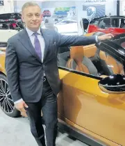  ??  ?? Posing for the lens in front of the drool-worthy BMW i8 is Dilawri Group of Companies’ Tony Dilawri.